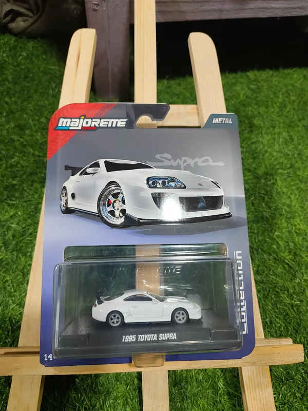 Majorette_1:64_Premium_Diecast_Model_Car_Collector_Edition_–_1995_TOYOTA_SUPRA_WHITE