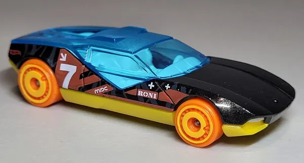 Hot_Wheels_1:64_Scale_STUNT_TRACKS__Pack_of_5_(_SCOOPA_DI_FUEGO,_LA_FASTA™,_REV_ROD™,_TORQUE_TWISTER™,_LIGHTNIN'_BUG™)