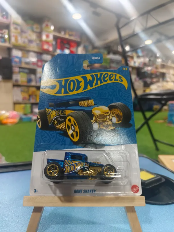 Hot_Wheels_1:64_Scale_BONE_SHAKER_58th_Anniversary_JKX81_BLUE_AND_GOLD_1/6