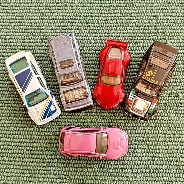Hot_Wheels_1:64_Scale_NIGHTBURNERZ_Pack_of_5_(87_FORD_SIERRA_COSWORTH,_NISSAN_MAXIMA_DRIFT_CAR,_20_TOYOTA_GR_SUPRA,_DIMACHINNI_VELOCE,_SUBARU_WRX_STI)