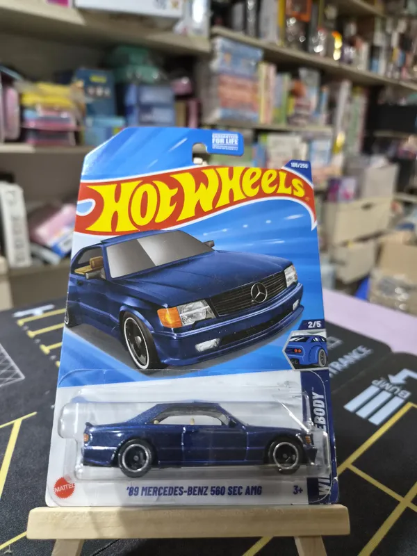 Hot_Wheels_1:64_Scale_89_MERCEDES-BENZ_560_SEC_AMG_WILD_WIDEBODY_2/5_BLUE_186/250_(USA_IMPORTED)