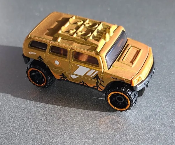 Hot_Wheels_1:64_Scale_HW_GETAWAYS_Pack_of_5_(HOVER_STORM,_CLASSIC_NOMAD,_RV_THERE_YET™,_ROCKSTER,_COCKNEY_CAB_II)