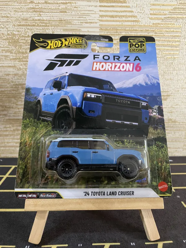 Hotwheels_Premium_1:64_Scale_Pop_culture_2026_24_TOYOTA_LAND_CRUISER_BLUE_JHX02_FORZA_HORIZON_6