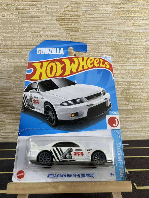 Hot_Wheels_1:64_Scale_NISSAN_SKYLINE_GT-R_(BCNR33)_HW_J-IMPORTS_5/10_WHITE_96/250_(GODZILLA)_2024