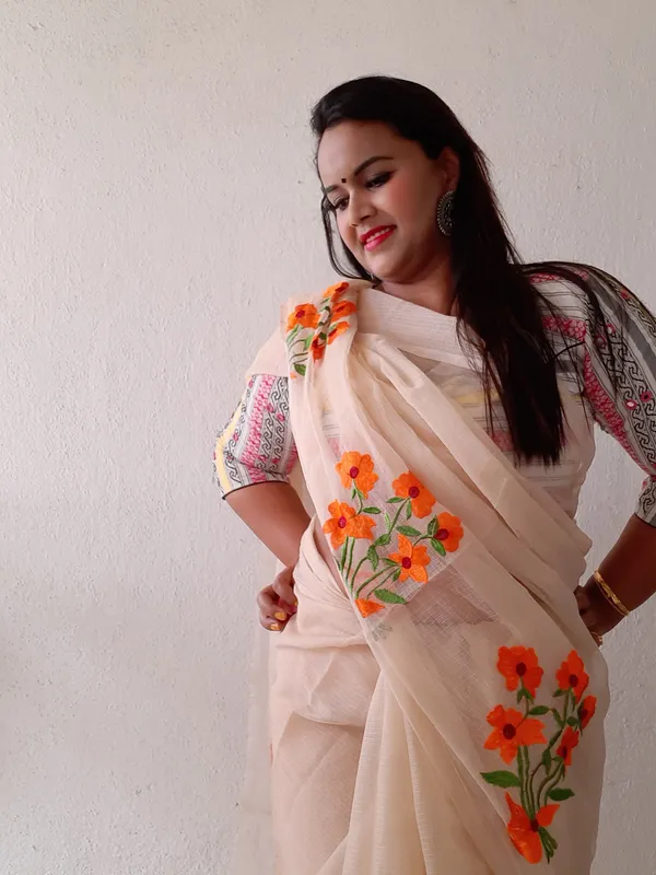 Rustic_Kota_Doria_Pure_Cotton_Floral_Embroidery_Saree_Brown