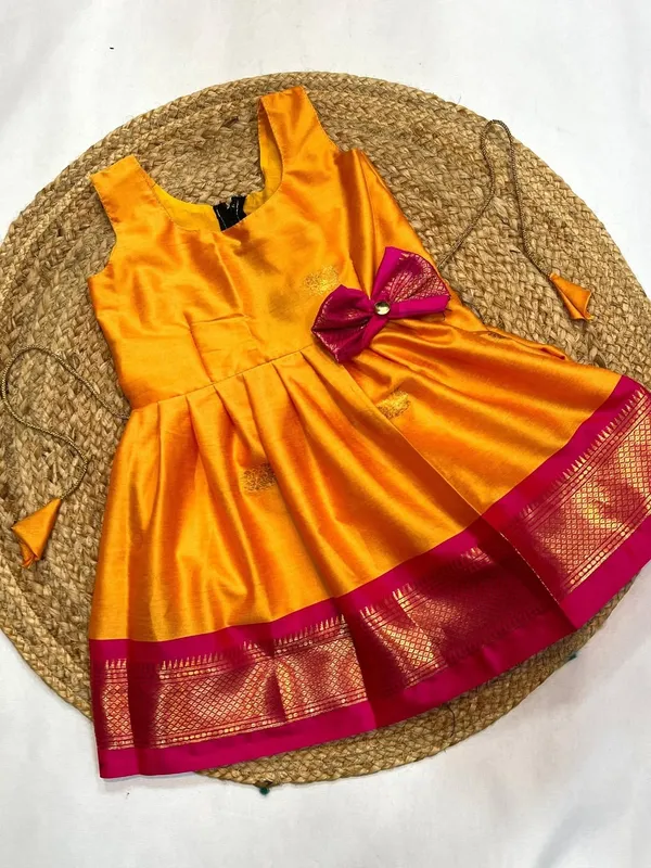 Festive_Mustard_Orange_Pattu_Pavadai_Frock_with_Kanchipuram_Border