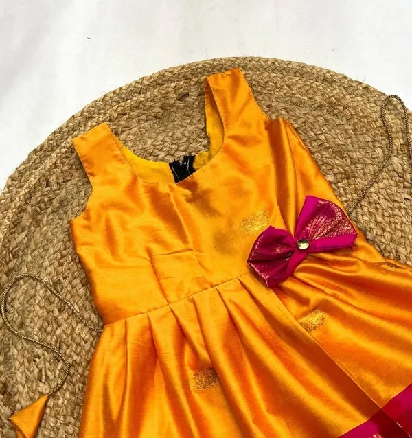 Festive_Mustard_Orange_Pattu_Pavadai_Frock_with_Kanchipuram_Border