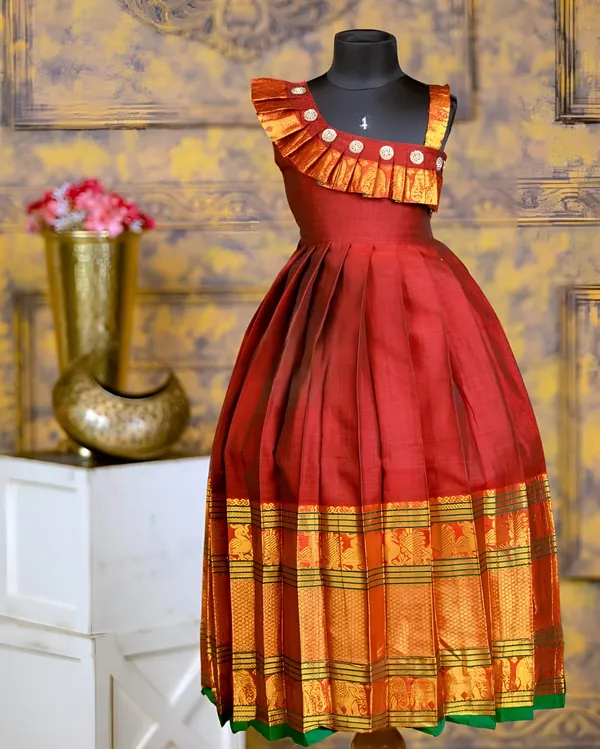 Regal_Rust_Maroon_(Red)_Pattu_Silk_Gown_with_Temple_Border_and_Ruffle_Yoke_for_Girls👑