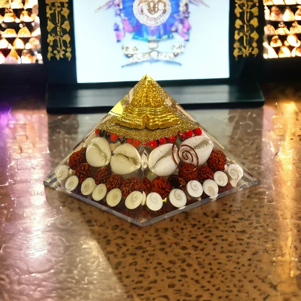Laxmi_Pyramid_Original_Certified_Gomati_Chakra,_Rudraksha,_Cowrie_Kodi_Maha_Laxmi_Pyramid_-_90mm_Large_Orgonite_Pyramid_with_Shree_Yantra