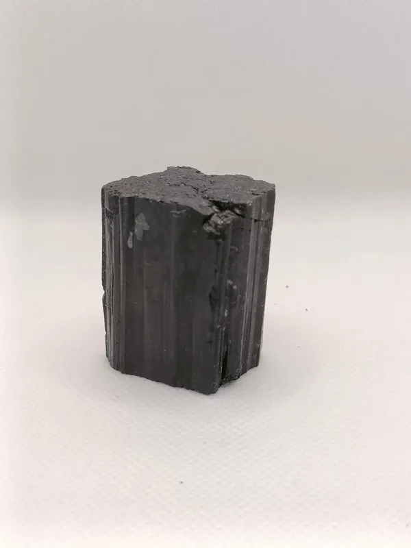 Selenite_Crystal_Stones_And_Black_Tourmaline_Used_For_Remove_Negative_Energy_And_Peace_And_Calm,_Mental_Clarity,_And_Well-Being._(Selenite_And_Black_Tourmaline)