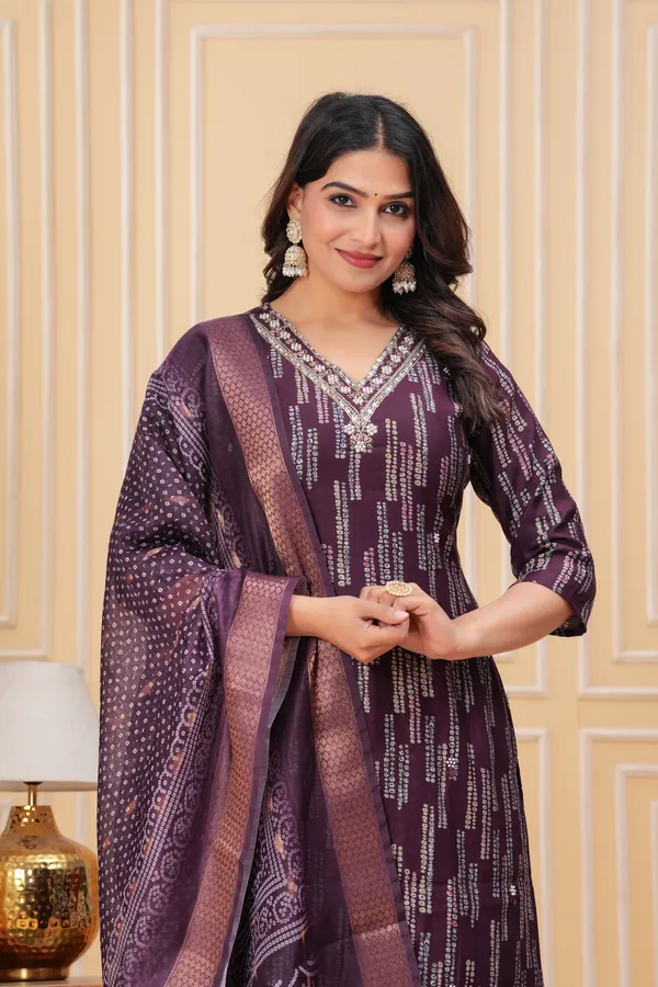 Elegant_Purple_Bandhani_Kurta_Set_with_Embellished_Neckline_new