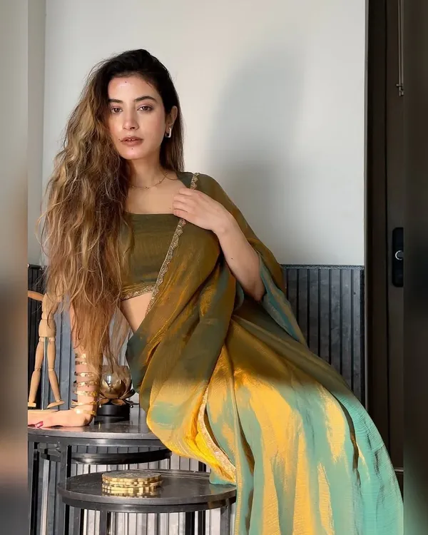Graceful_Green_Fancy_Silk_Saree_With_Outstanding_Blouse_Piece