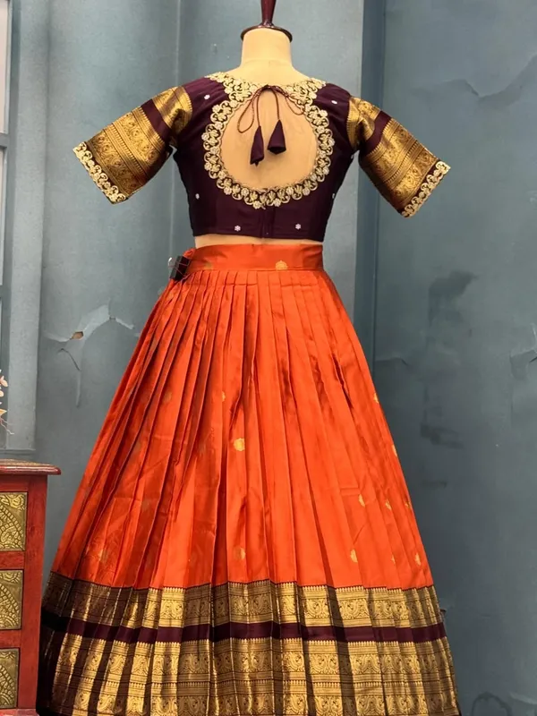 Traditional_Orange_and_Purple_Silk_Half_Saree_with_Zari_Woven_Border