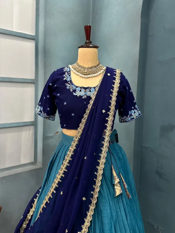 Traditional_firozi_and_blue_Silk_Half_Saree_with_Zari_Woven_Border