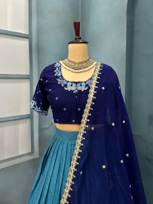 Traditional_firozi_and_blue_Silk_Half_Saree_with_Zari_Woven_Border