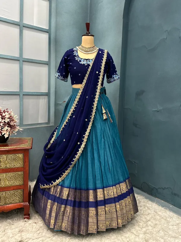 Traditional_firozi_and_blue_Silk_Half_Saree_with_Zari_Woven_Border