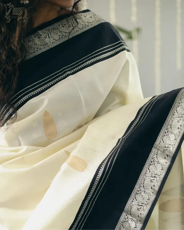 Off_White_Banarasi_Soft_Lichi_Designer_Silk_Saree_With_Unstitched_Blouse_Piece_For_Women