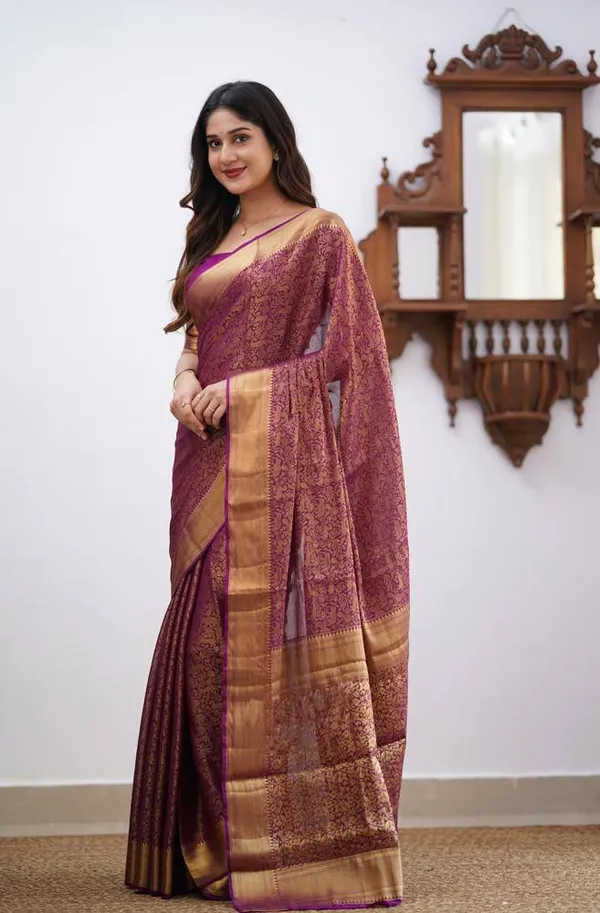 Wine_Soft_Lichi_Designer_Silk_Saree_With_Unstitched_Blouse_Piece_For_Women