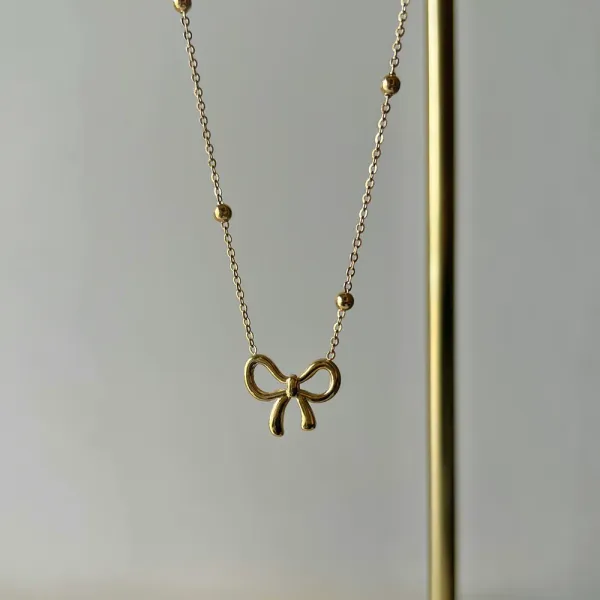 8k_Gold_Plated_Stainless_Steel_Unique_Bow_Shaped_Anti_Tarnish_Necklace_For_Women