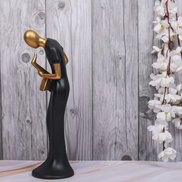 Black_And_Gold_Handcrafted_Resin_Saxophone_Women_Player_Showpiece_For_Home_And_Office_Decor_8.9_X_8.9_X_30.5_Cm