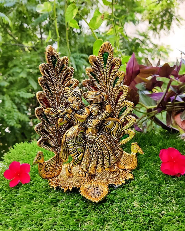 Golden_Metal_Peacock_Design_Radha_Krishna_Idol_Showpiece_With_Diya_For_Puja_And_Home_Decor_(6.6_Inch_X_5.4_Inch)