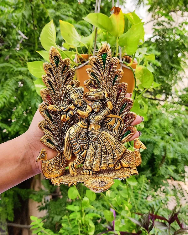 Golden_Metal_Peacock_Design_Radha_Krishna_Idol_Showpiece_With_Diya_For_Puja_And_Home_Decor_(6.6_Inch_X_5.4_Inch)
