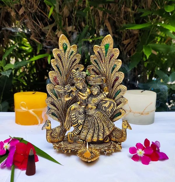 Golden_Metal_Peacock_Design_Radha_Krishna_Idol_Showpiece_With_Diya_For_Puja_And_Home_Decor_(6.6_Inch_X_5.4_Inch)
