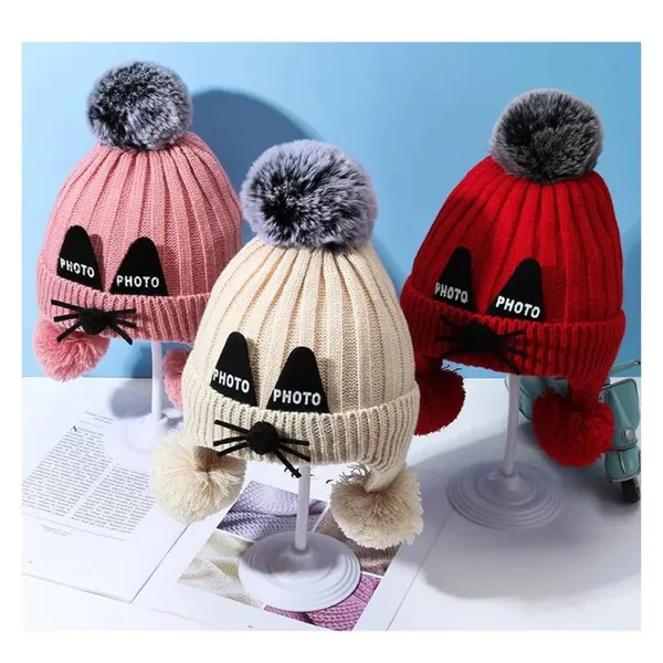 Pink_Knitted_Pom-Pom_Cap_With_Faux_Raccoon_Fur_For_Boys_And_Girls