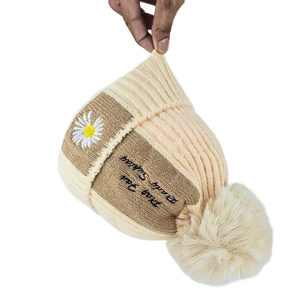 Cream_Pom_Pom_Beanie_With_Daisy_Patch_Warm_Knit_Fleece_Lined_Hat_For_Women_And_Girls
