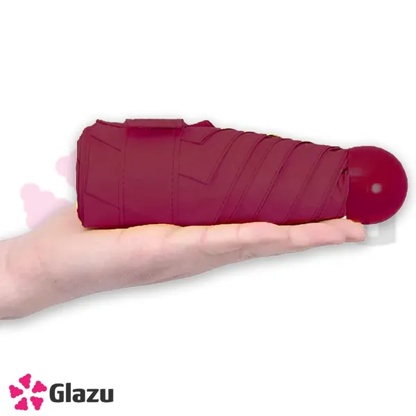 Fold_Travel_Capsule_Umbrella_UV_Protection_Umbrella_|_Compact,_Windproof,_And_Lightweight_Umbrella_For_All_Seasons_(Random_Colors)