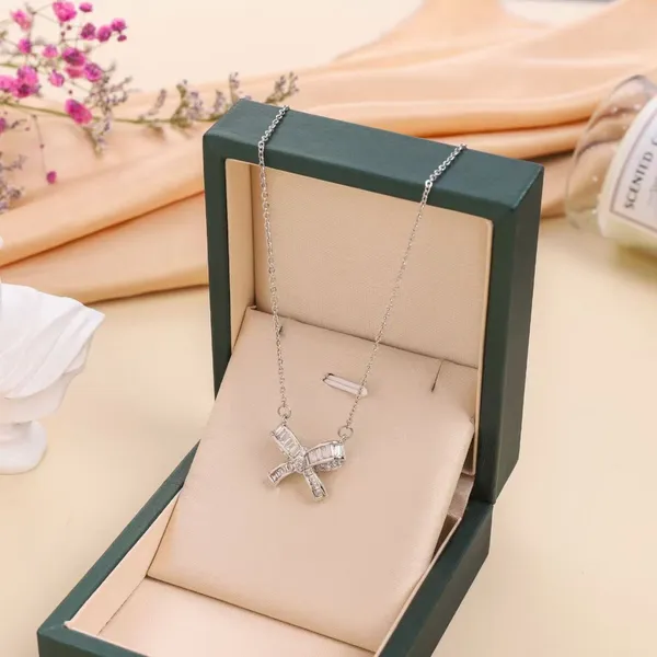 Radiant_Silver_Plated_Bow_Shape_Stone_Embedded_Necklace_For_Women_&_Girls