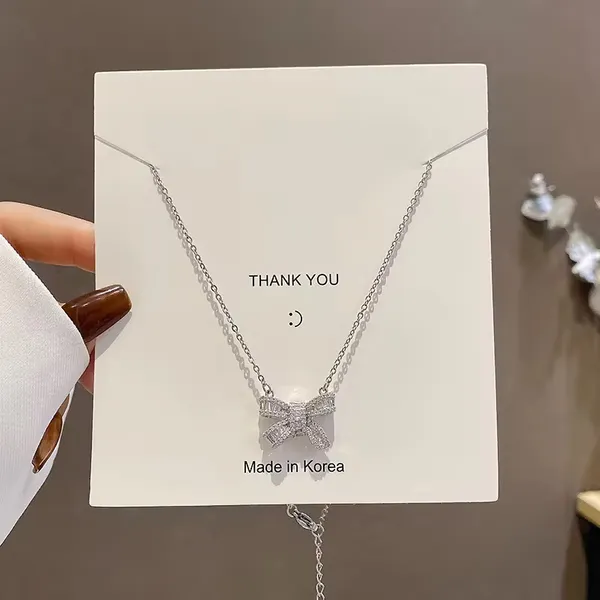 Bow_Shape_Sparkeling_Silver_Plated_Stone_Embedded_Necklace_For_Women_&_Girls