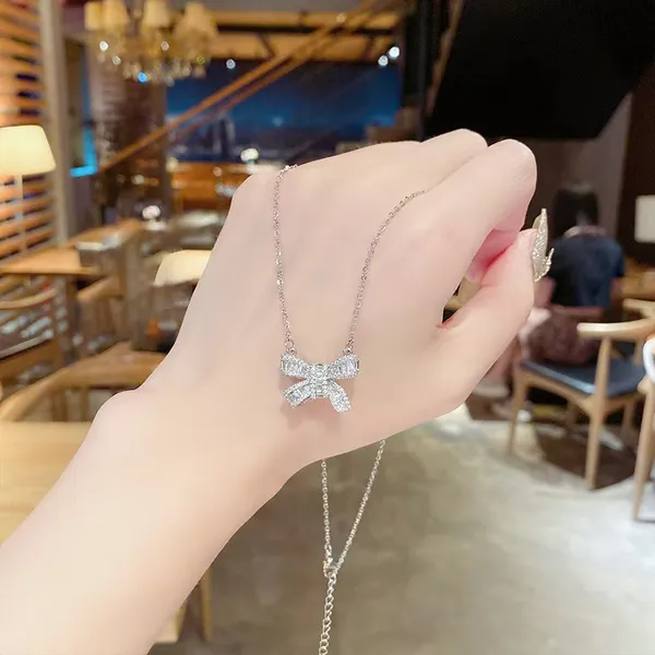 Bow_Shape_Sparkeling_Silver_Plated_Stone_Embedded_Necklace_For_Women_&_Girls