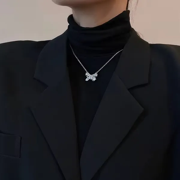 Bow_Shape_Sparkeling_Silver_Plated_Stone_Embedded_Necklace_For_Women_&_Girls