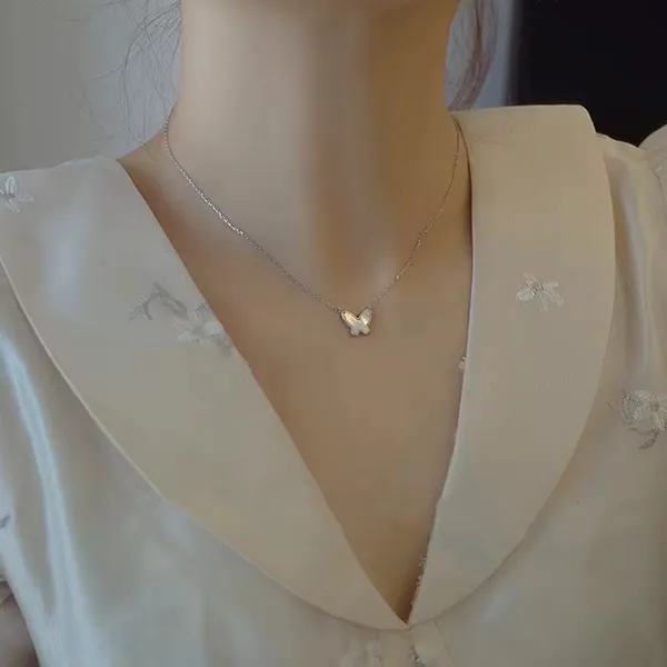 White_shell_plated_butterfly_pendant_necklace