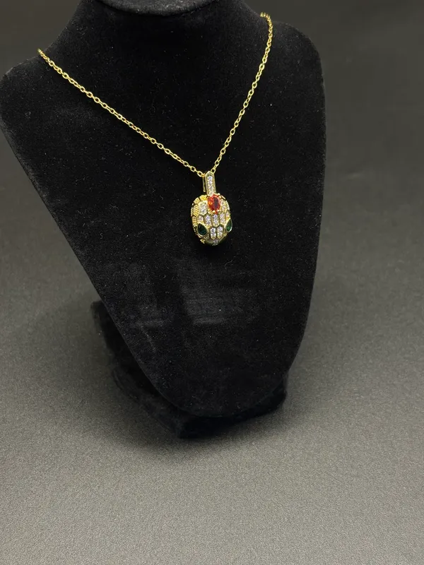 Snake_Shape_Golde_Plated_Stone_Embedded_Pendant_With_Chain_For_Women_&_Girls