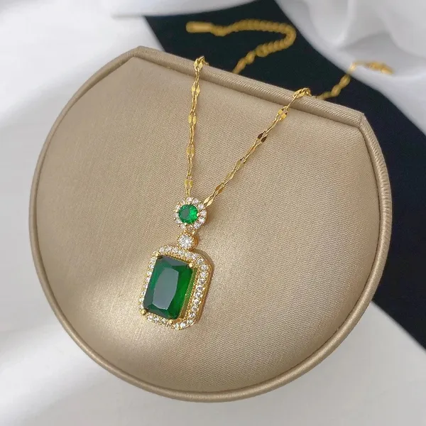 Green_Emerald_Stone_Embedded_Pendant_With_Gold_Plated_Chain_For_Women_&_Girls