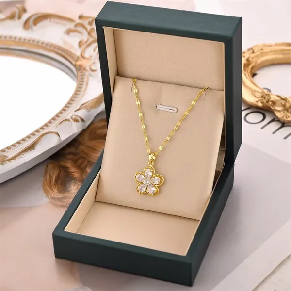 Flower_Shape_Stone_Embedded_Gold_Plated_Pendant_With_Chain_For_Women_&_Girls