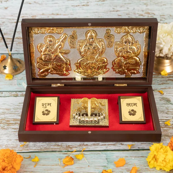 Gold_Plated_Lakshmi_Ganesh_Saraswati_Charan_Paduka_In_Brown_Pooja_Box