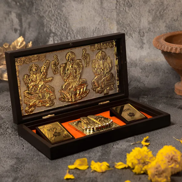 Gold_Plated_Lakshmi_Ganesh_Saraswati_Charan_Paduka_In_Brown_Pooja_Box