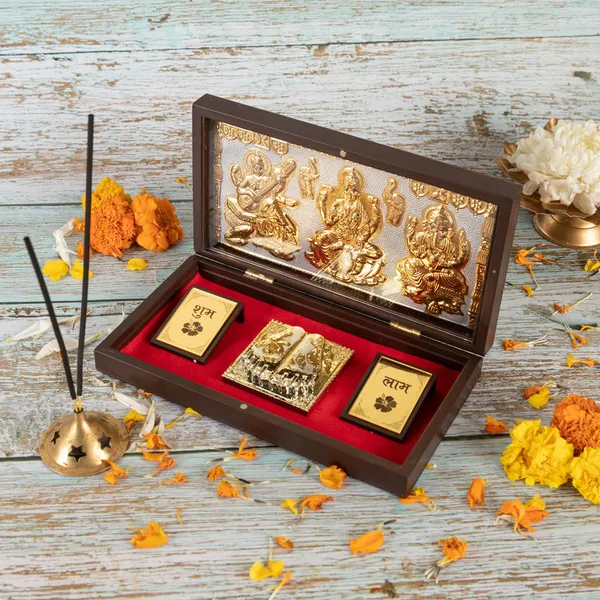 Gold_Plated_Lakshmi_Ganesh_Saraswati_Charan_Paduka_In_Brown_Pooja_Box