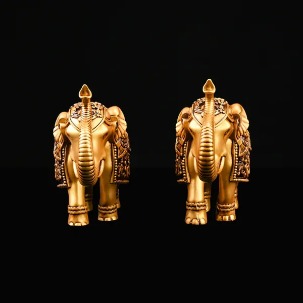Golden_Royal_Elephant_Showpiece_Statue_Figurine_Showpiece_Set_of_2_(16L_X_6.8W_X_12H_Centimeters)