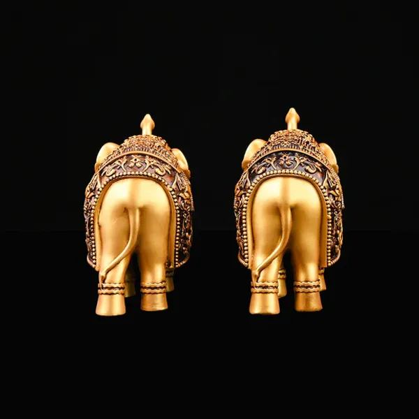 Golden_Royal_Elephant_Showpiece_Statue_Figurine_Showpiece_Set_of_2_(16L_X_6.8W_X_12H_Centimeters)