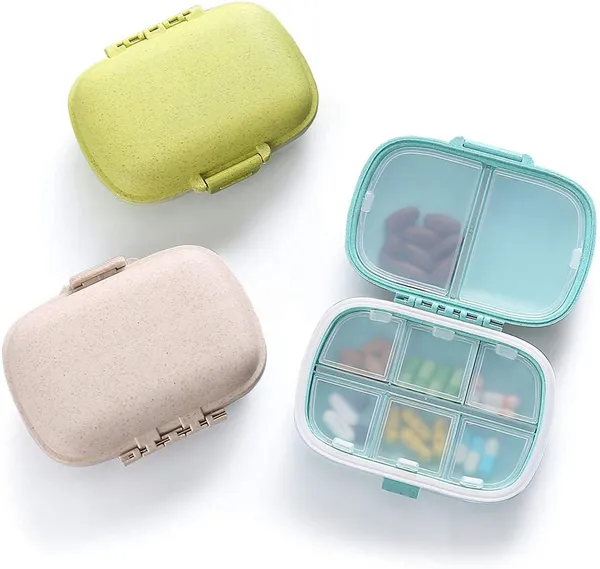 Multicolor_Moisture_Proof_Travel_Pill_Organizer_with_8_Compartments_(11_X_9_X_2.5_Cm)