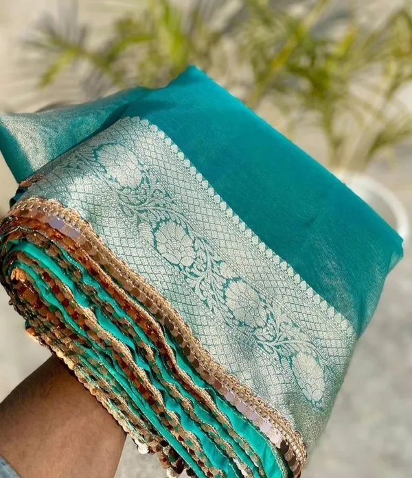 Banarasi_Firozi_Blue_Jahnvi_Kapoor_Inspired_Tissue_Silk_Shimmer_Saree_With_Sequence_Lace_With_Unstitched_Blouse_Piece