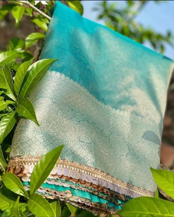 Banarasi_Firozi_Blue_Jahnvi_Kapoor_Inspired_Tissue_Silk_Shimmer_Saree_With_Sequence_Lace_With_Unstitched_Blouse_Piece
