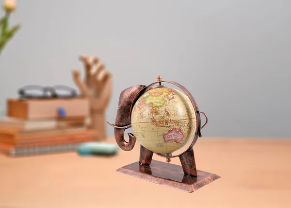 Copper_Metal_Table_Globe_Elephant_Shaped_With_A_Revolving_Tummy_(25_X_10_X_20_Cm)