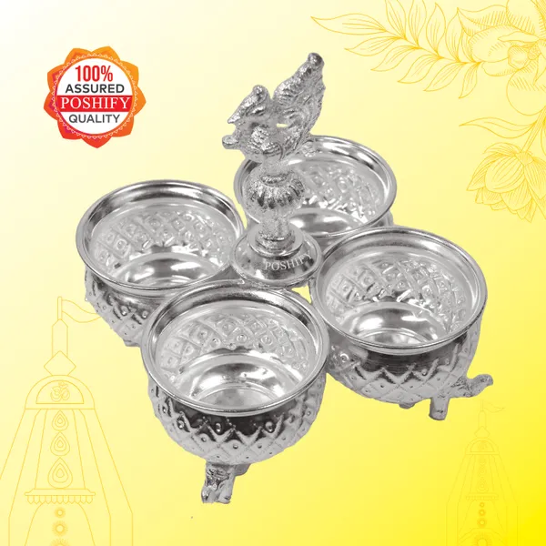 German_Silver_Kumkum_&_Haldi_Holder_With_Four_Attached_Bowls_And_Handle