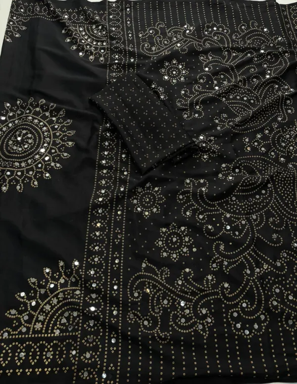 Black_saree_embellished_with_traditional_Bandhani_and_circular_motif_prints_and_Real_mirror_Work