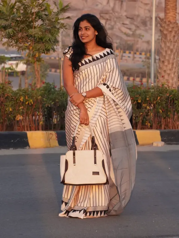 Elegant_Beige_Satin_Saree_with_Black_Line_Design_&_Black_Pallu_–_Timeless_Grace